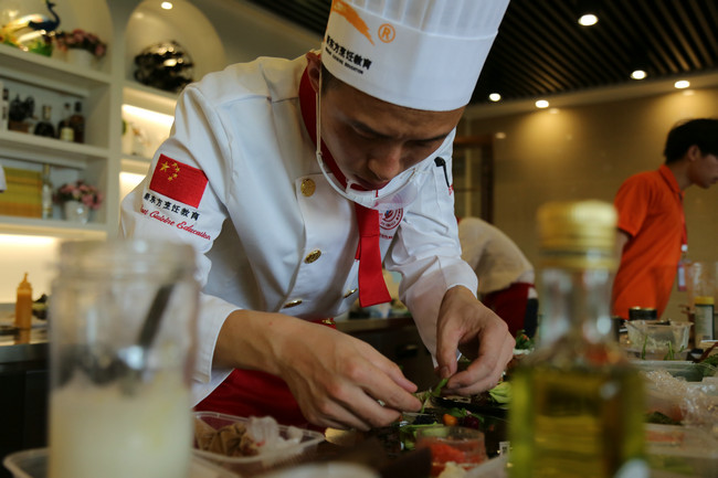 第四届“丘比杯”全国烹饪技能大赛教师组决赛隆重启幕